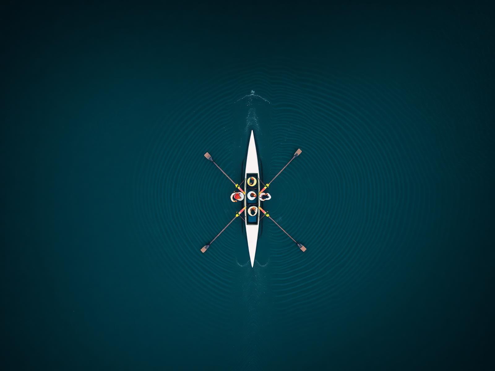 Aerial view of a rowing crew in sync